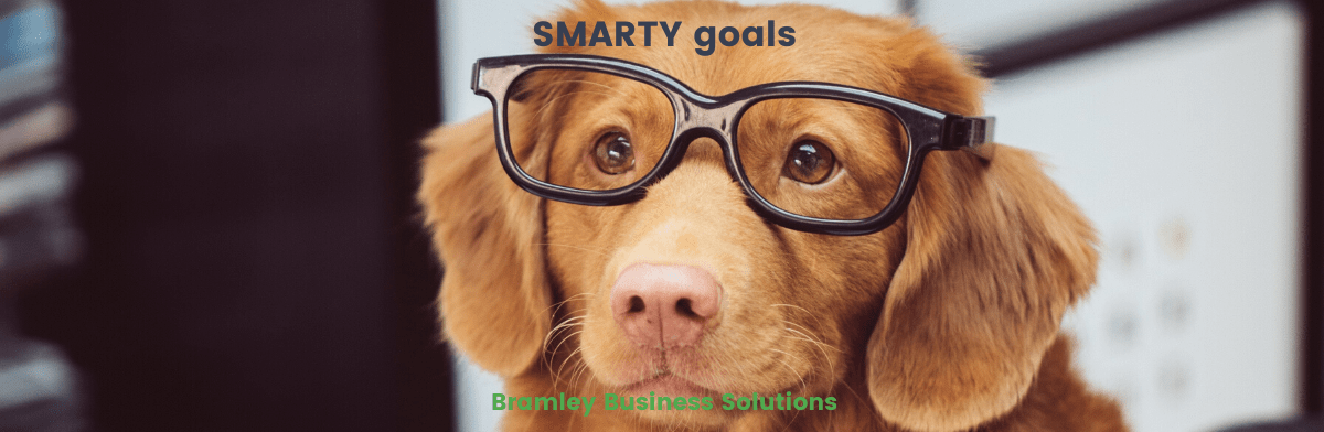 Dog in glasses looking smart for SMARTY goals