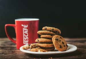 Batching - a batch of biscuits with a cup of coffee