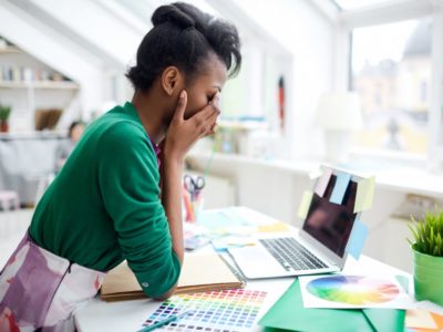 summer burnout frustrated young businesswoman who needs business solutions for small business